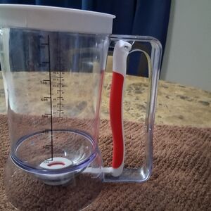 Clear Measuring Pitcher with Red Handle